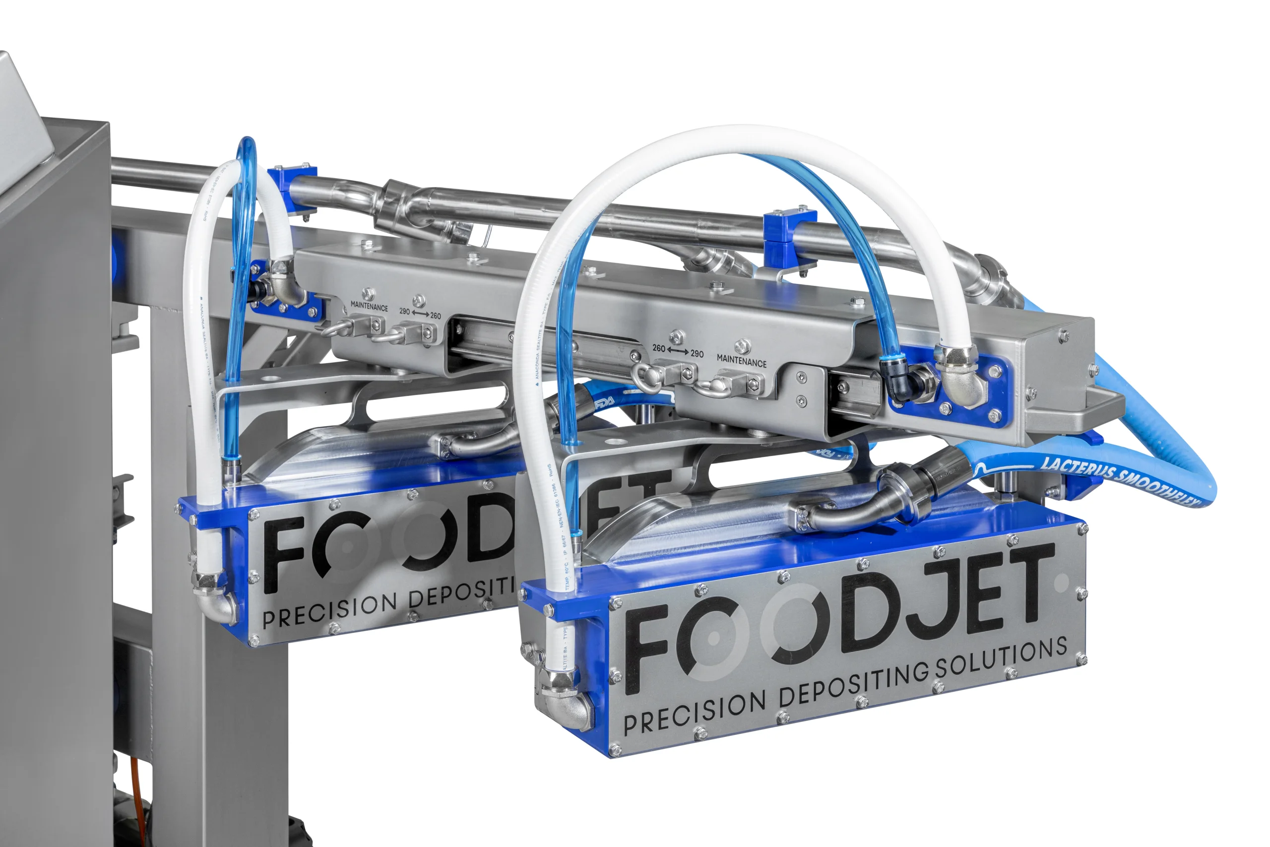 Depositing heads with air lines on an MDSUC depositor, with the FoodJet logo on the frame